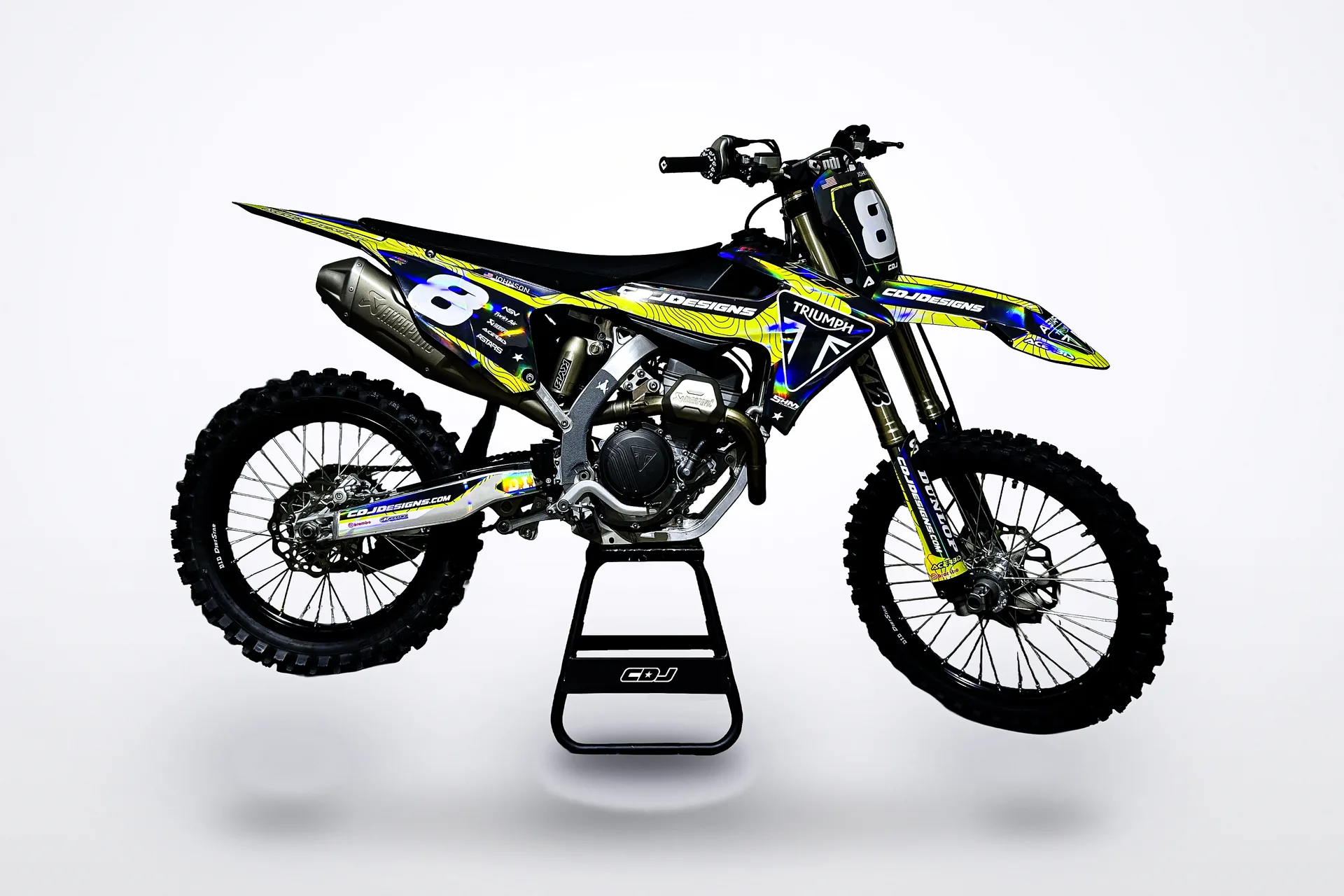 Triumph TF 250-X wearing the CDJ Designs Topo Series graphics kit, studio photo